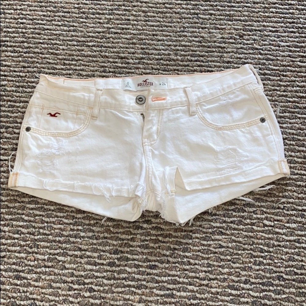 Off white, distressed Hollister shorts.